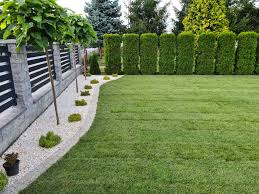 Curved border with layered planting for year-round interest